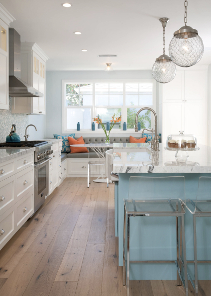 Classic white kitchen.  pop of color for island.  lights