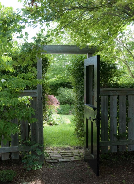 Inviting garden door.  lush